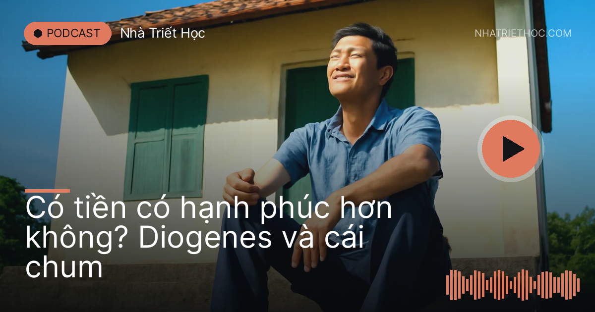 Người đàn ông ngồi phơi nắng trên bậc thềm đá trước căn nhà nhỏ